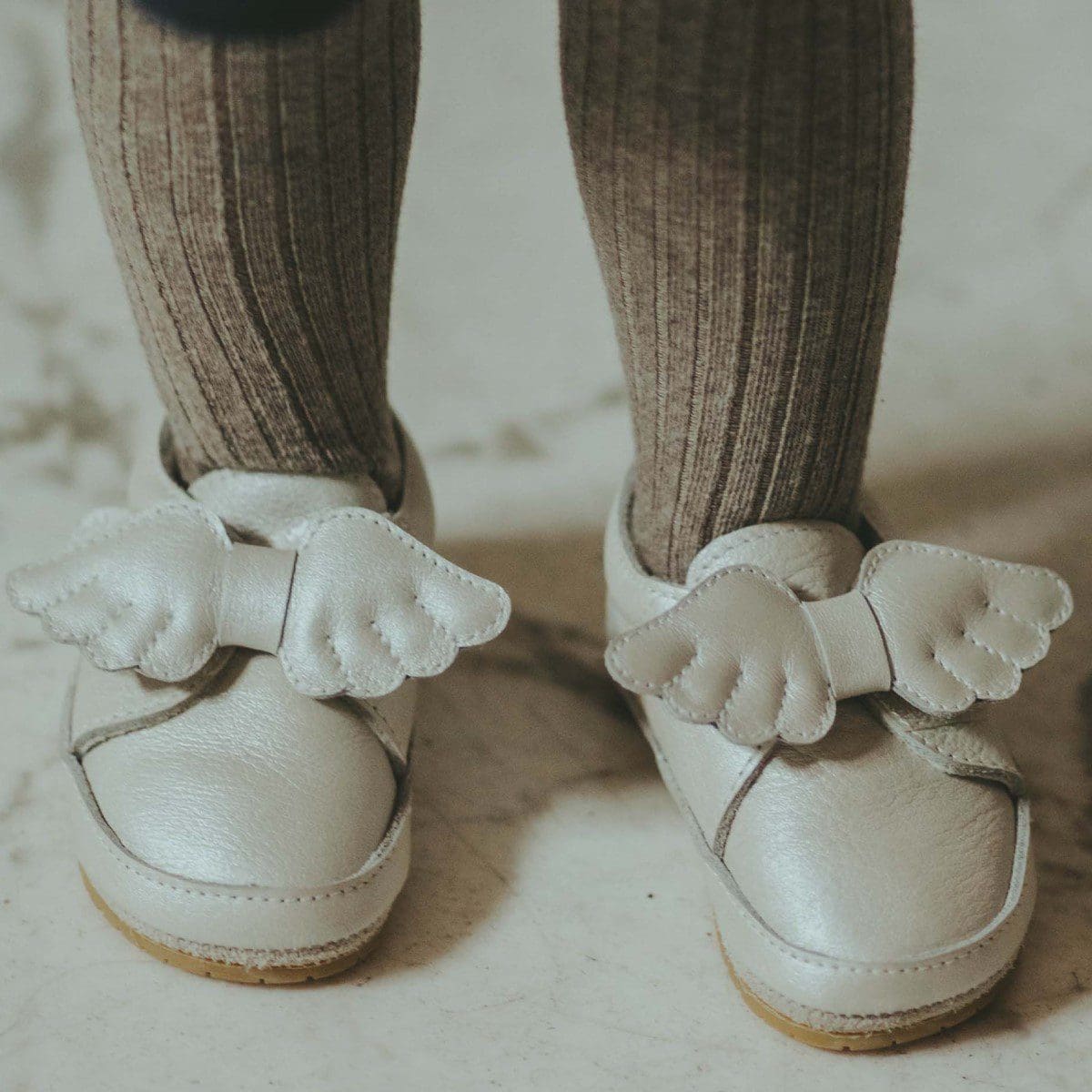 Sela | Off White Metallic Leather