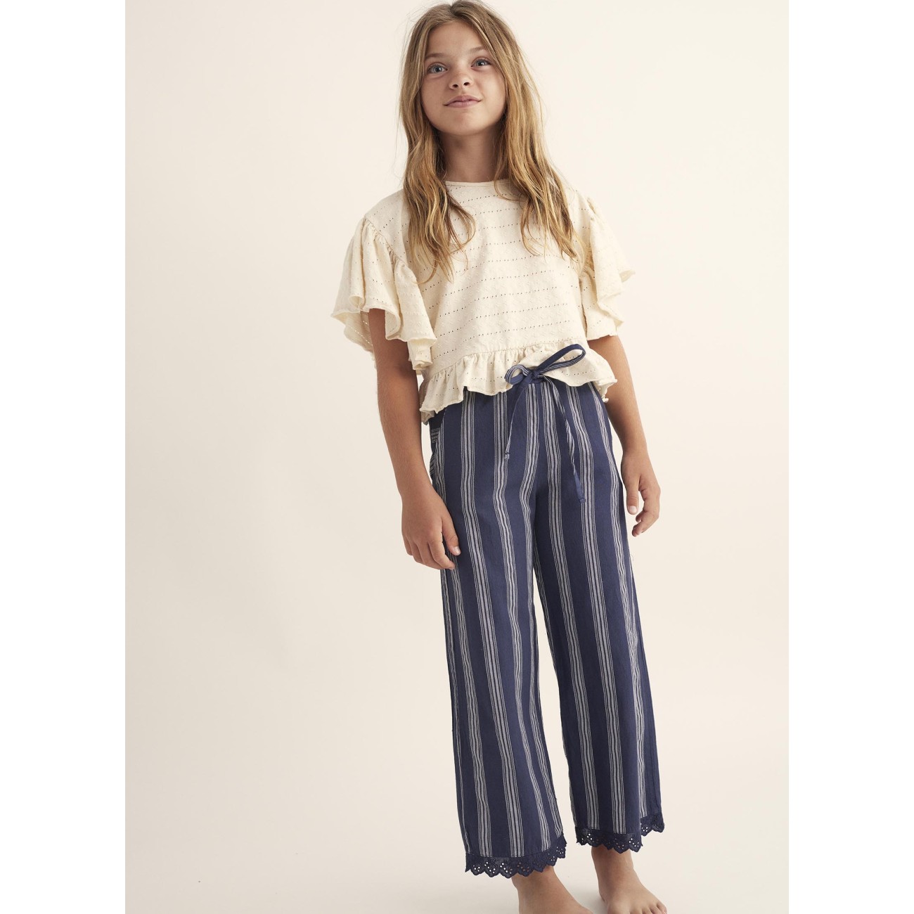 Elviak Ivory Hacquard Tshirt & Bellak Navy Striped Ruffle Pants