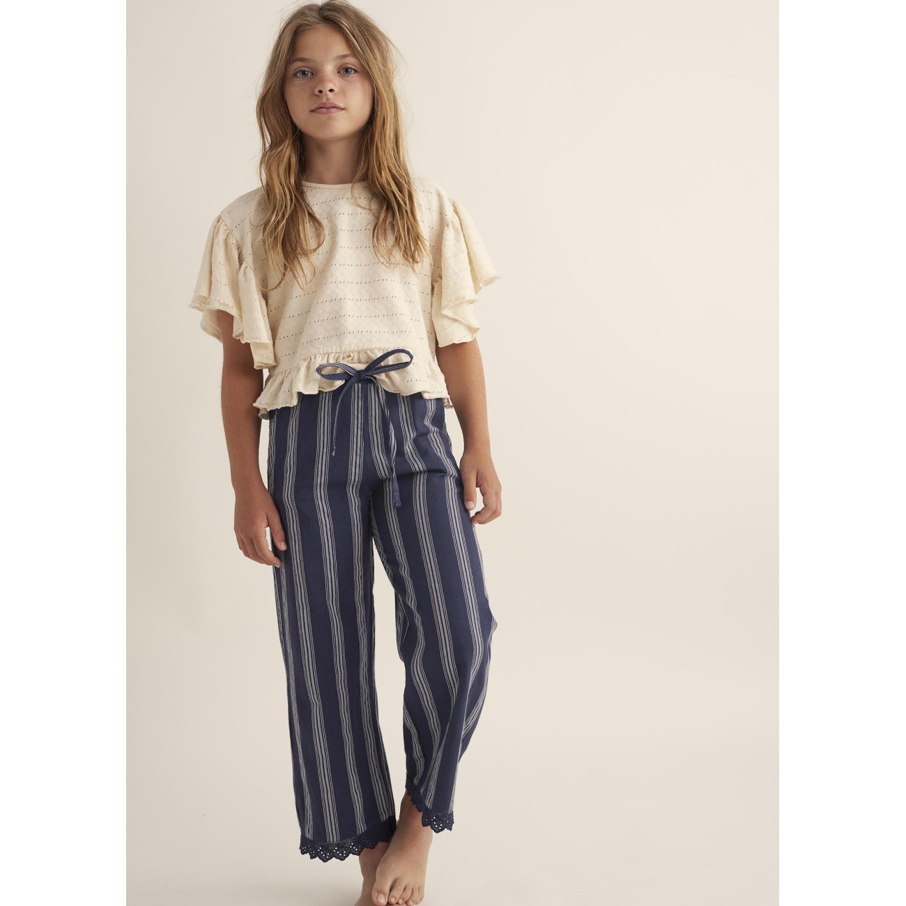 Elviak Ivory Hacquard Tshirt & Bellak Navy Striped Ruffle Pants