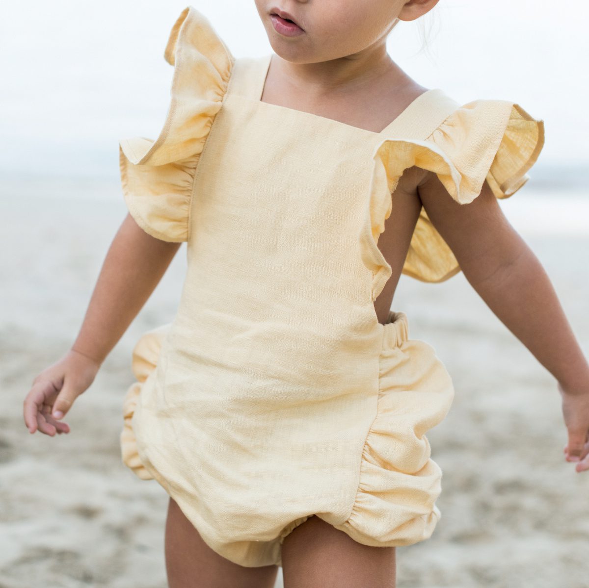 Frilled Lillie Romper | Peach